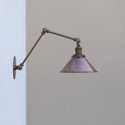 Adjustable Swing-Arm Wall Sconce with Aged Copper Cone Shade