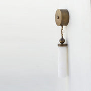 Alabaster Column Wall Sconce with Brass Disc Backplate