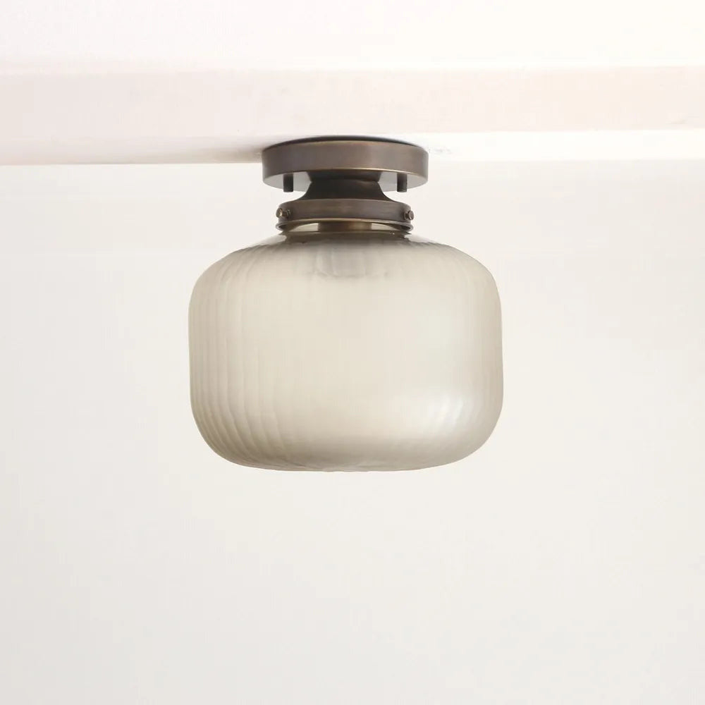 brass-flush-mount-ceiling-light-with-textured-glass-shade-01
