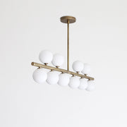 Brass Linear Chandelier with Ribbed Opal Globes