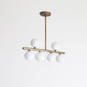 Brass Linear Chandelier with Ribbed Opal Globes