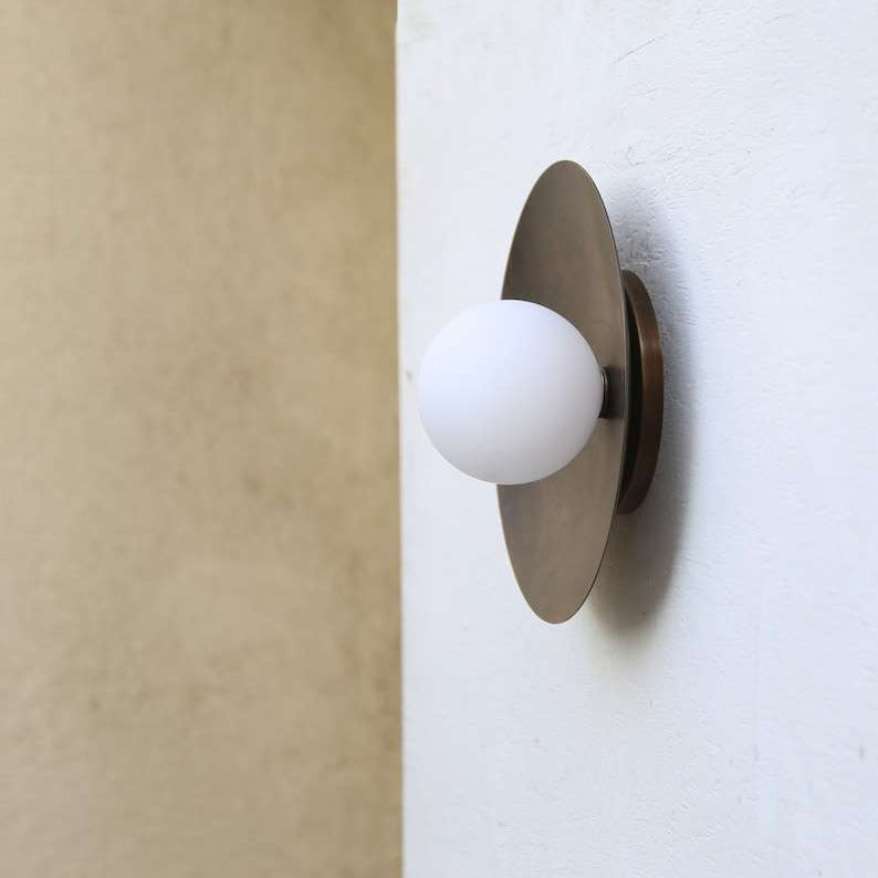brass-wall-sconce-with-matte-white-glass-shade-1