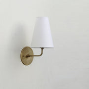 Curved Arm Brass Wall Sconce with Tapered Linen Shade