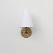 Curved Arm Brass Wall Sconce with Tapered Linen Shade
