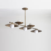 Five-Light Linear Brass Chandelier with Disc Shades and Glass Globes