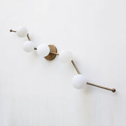 Five-Light Staggered Brass Bar Sconce with Opal Glass Globes