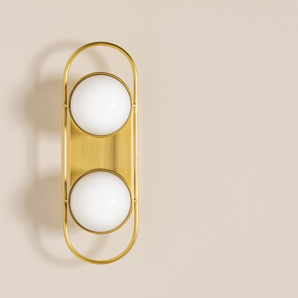lyra-aged-brass-globe-vanity-sconce-01