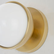 Lyra Aged Brass Globe Vanity Sconce