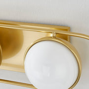 Lyra Aged Brass Globe Vanity Sconce