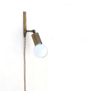 One-Light Adjustable Plug-In Wall Sconce with Exposed Bulb
