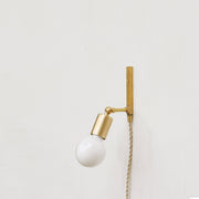 One-Light Adjustable Plug-In Wall Sconce with Exposed Bulb