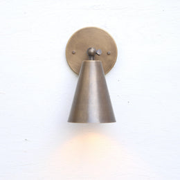 One-Light Adjustable Wall Sconce with Large Brass Cone