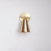 One-Light Adjustable Wall Sconce with Large Brass Cone