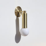 One-Light Brass Cylinder Wall Sconce with Exposed Bulb