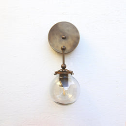 One-Light Brass Wall Sconce with Smoked Glass Globe