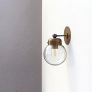 One-Light Clear Glass Globe Wall Sconce