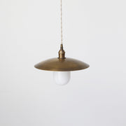One-Light Cord Pendant with Twelve-Inch Brass Disc Shade