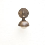 One-Light Curved Arm Wall Sconce with Brass Dome Shade