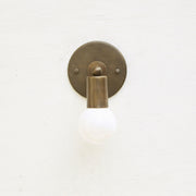 One-Light Minimal Brass Wall Sconce with Angled Socket