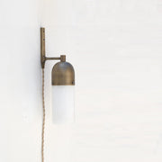 One-Light Plug-In Alabaster Sconce with Brass Dome Cap