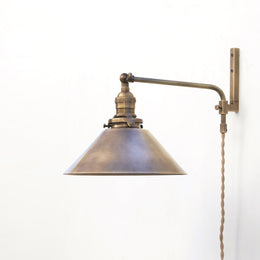 One-Light Plug-In Swing Arm Wall Sconce with Brass Cone Shade