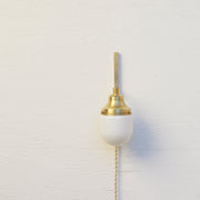 One-Light Plug-In Wall Sconce with Opal Glass Shade