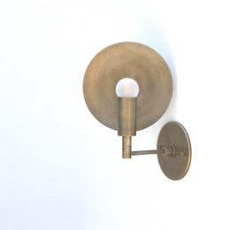 One-Light Wall Sconce with Round Brass Reflector Disc