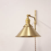 Plug-In Swing Arm Wall Sconce with Brass Cone Shade