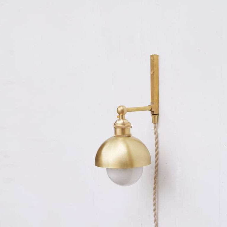 Minimalist Half-Globe Brass Shade Plug In Wall Sconce
