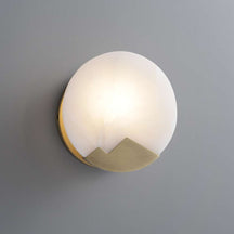 round-alabaster-wall-sconce-with-brass-frame-1