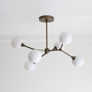 Six-Light Brass Branch Chandelier with Opal Glass Globes