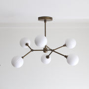 Six-Light Brass Branch Chandelier with Ribbed Opal Globes