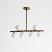 Six-Light Brass Linear Chandelier with Ribbed Opal Globes