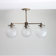 Three-Light Brass Chandelier with Diamond-Cut Frosted Globes