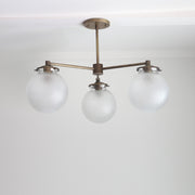 Three-Light Brass Chandelier with Frosted Globes