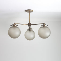 Three-Light Brass Chandelier with Ribbed Frosted Glass Globes
