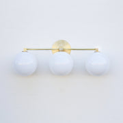 Three-Light Brass Vanity Sconce with Six-Inch Opal Globes