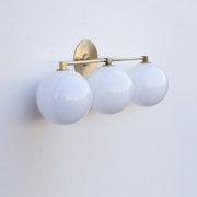 Three-Light Brass Vanity Sconce with Six-Inch Opal Globes