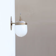 Two-Light Brass Vanity Sconce with Opal Capsule Shades