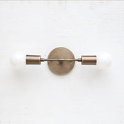 Two-Light Brass Wall Sconce with Exposed Bulbs