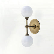 Two-Light Brass Wall Sconce with Stacked Ribbed Opal Globes