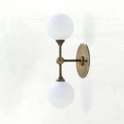 Two-Light Brass Wall Sconce with Stacked Ribbed Opal Globes