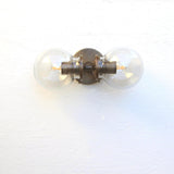 Two-Light Clear Glass Globe Vanity Wall Sconce