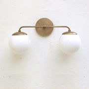 Two-Light Opal Globe Bathroom Vanity Wall Sconce