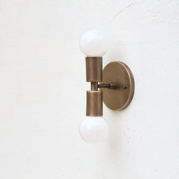 Two-Light Stacked Brass Wall Sconce with Exposed Bulbs