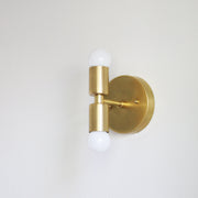 Two-Light Stacked Brass Wall Sconce with Exposed Bulbs