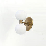 Two-Light Vertical Brass Wall Sconce with Ribbed Opal Globes