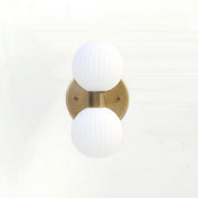 Two-Light Vertical Brass Wall Sconce with Ribbed Opal Globes