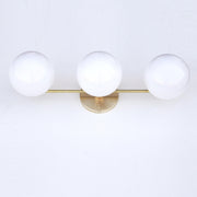 Wide Three-Light Brass Vanity Sconce with Six-Inch Opal Globes