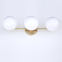 Wide Three-Light Brass Vanity Sconce with Six-Inch Opal Globes